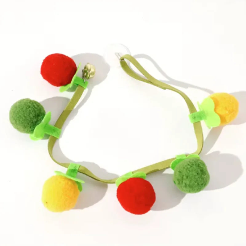 Sustainable cat toy in the shape of a tomato with bell, interactive self-play toy for kittens against boredom, essential pet supplies