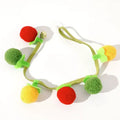 Sustainable cat toy in the shape of a tomato with bell, interactive self-play toy for kittens against boredom, essential pet supplies